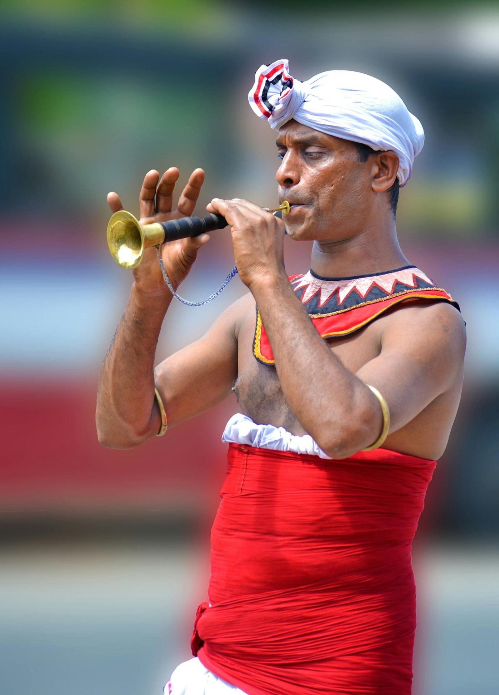 Man Playing Brass Instrument during Daytime