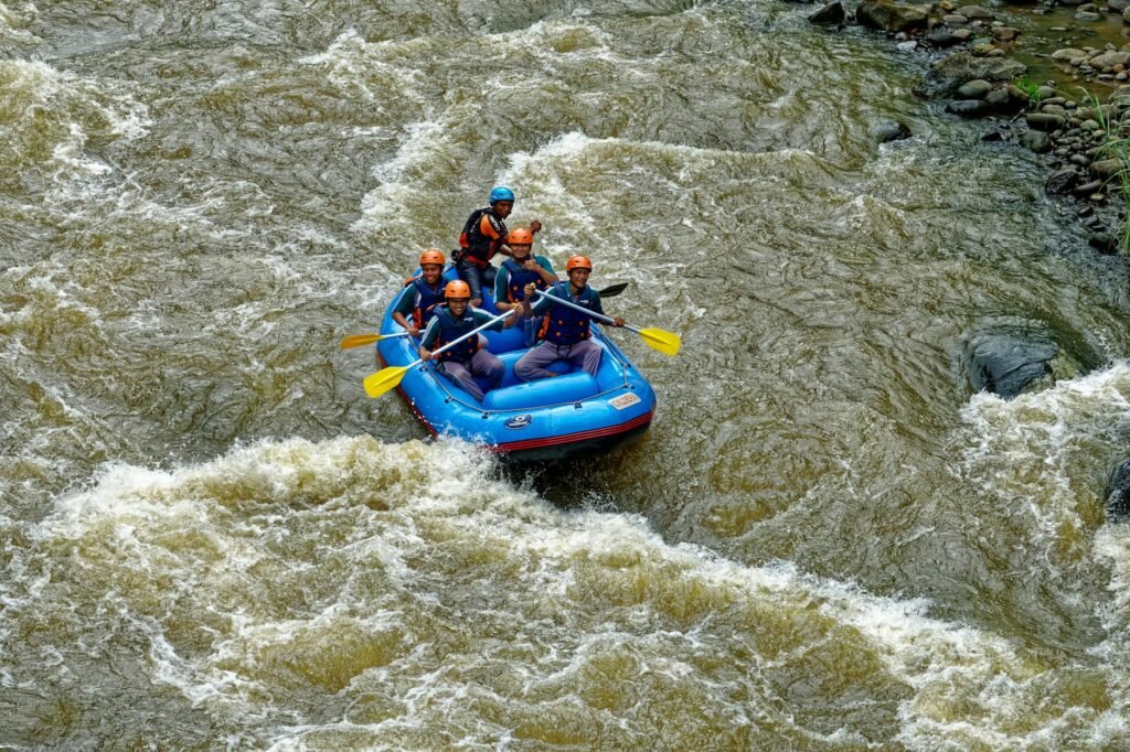 people riding on inflatable boat