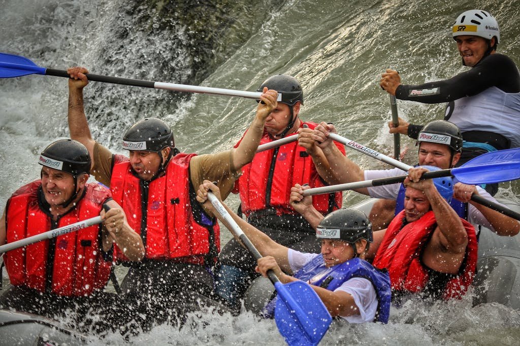 Men paddling on a Rafting Sport